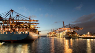 a large ship is docked at a dock