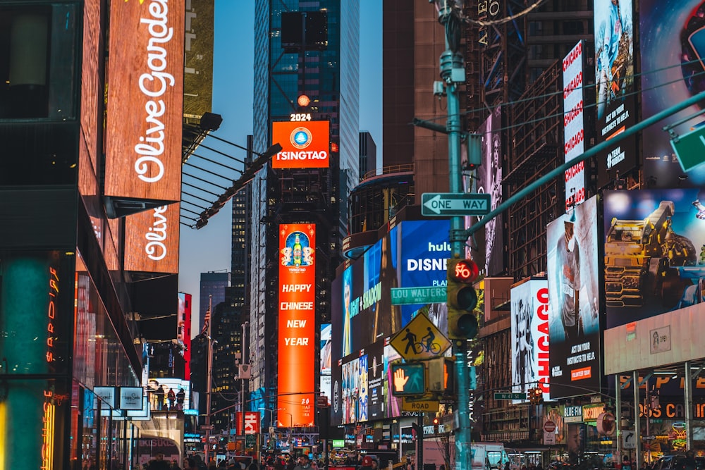 a city street filled with lots of tall buildings