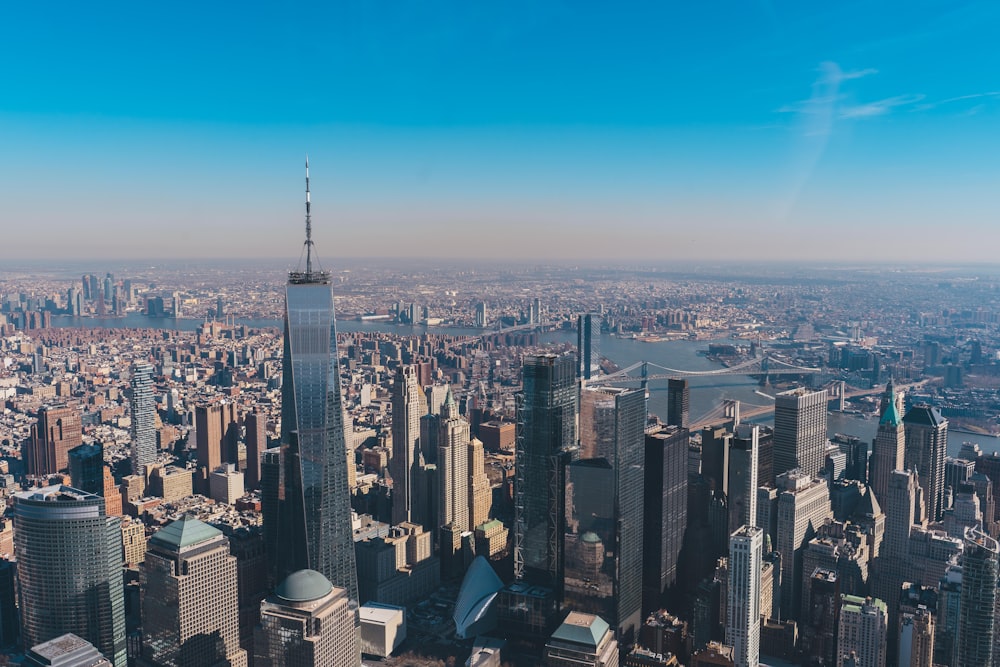 an aerial view of a city with tall buildings