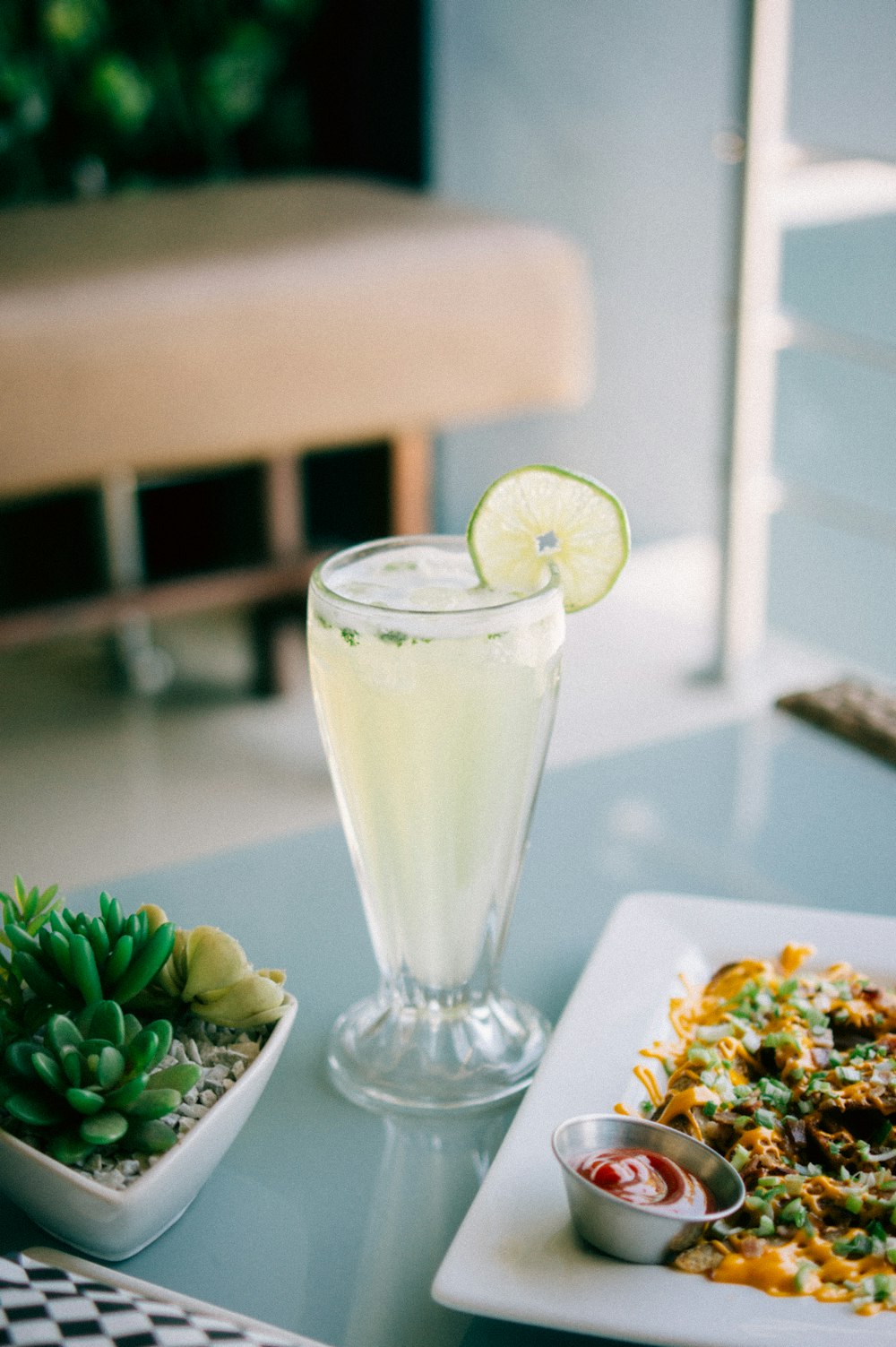 a plate of food and a drink on a table