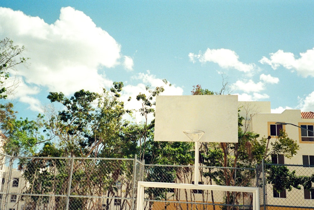 a basketball hoop in front of a building