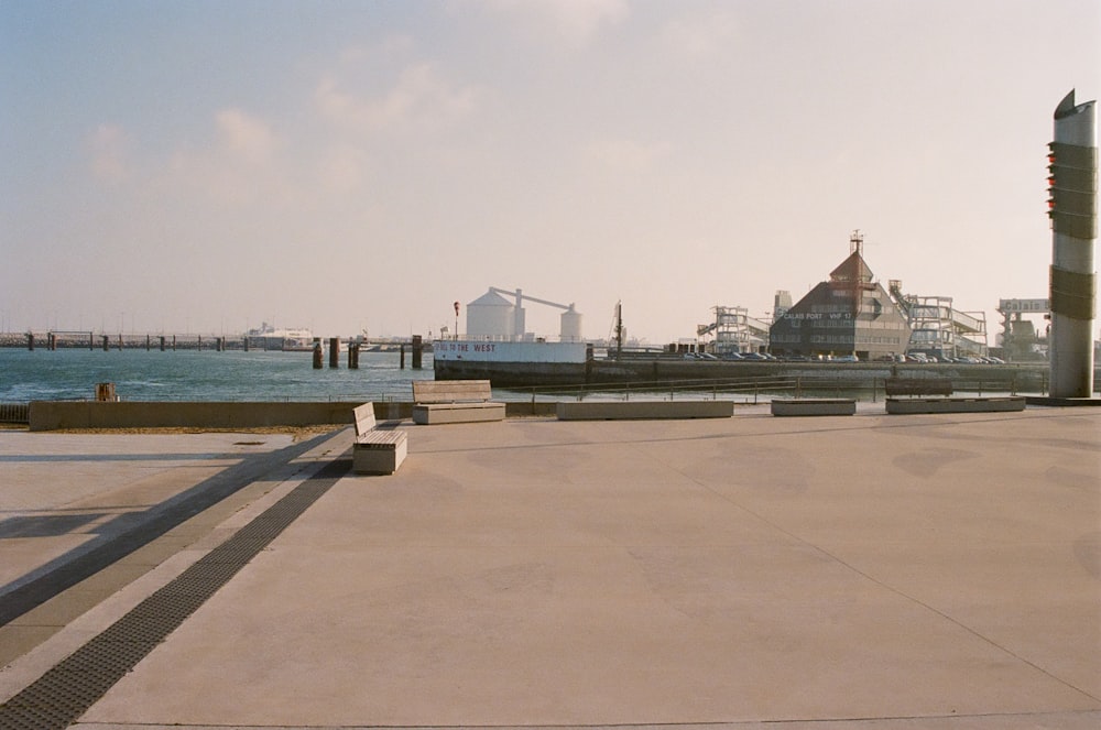 a large body of water sitting next to a pier