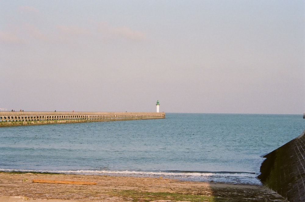 a view of a lighthouse from a beach