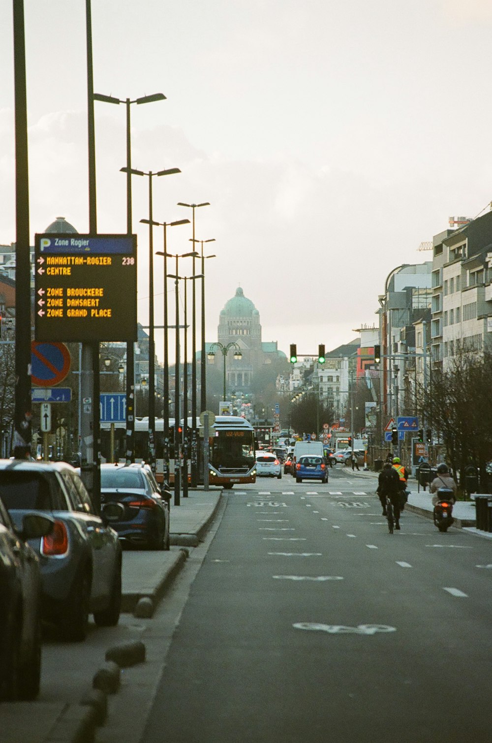 a city street filled with lots of traffic