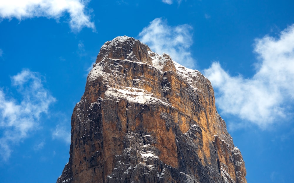 a very tall mountain with snow on it