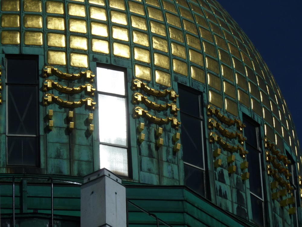 a large building with a gold dome on top of it