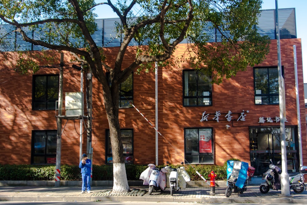 a group of people standing in front of a building