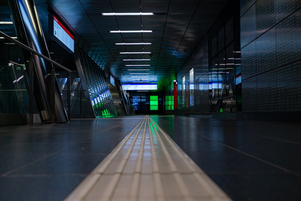 a long hallway with a long white line on the floor