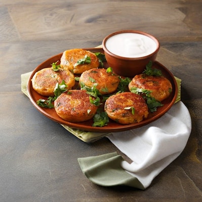 a plate of food on a wooden table