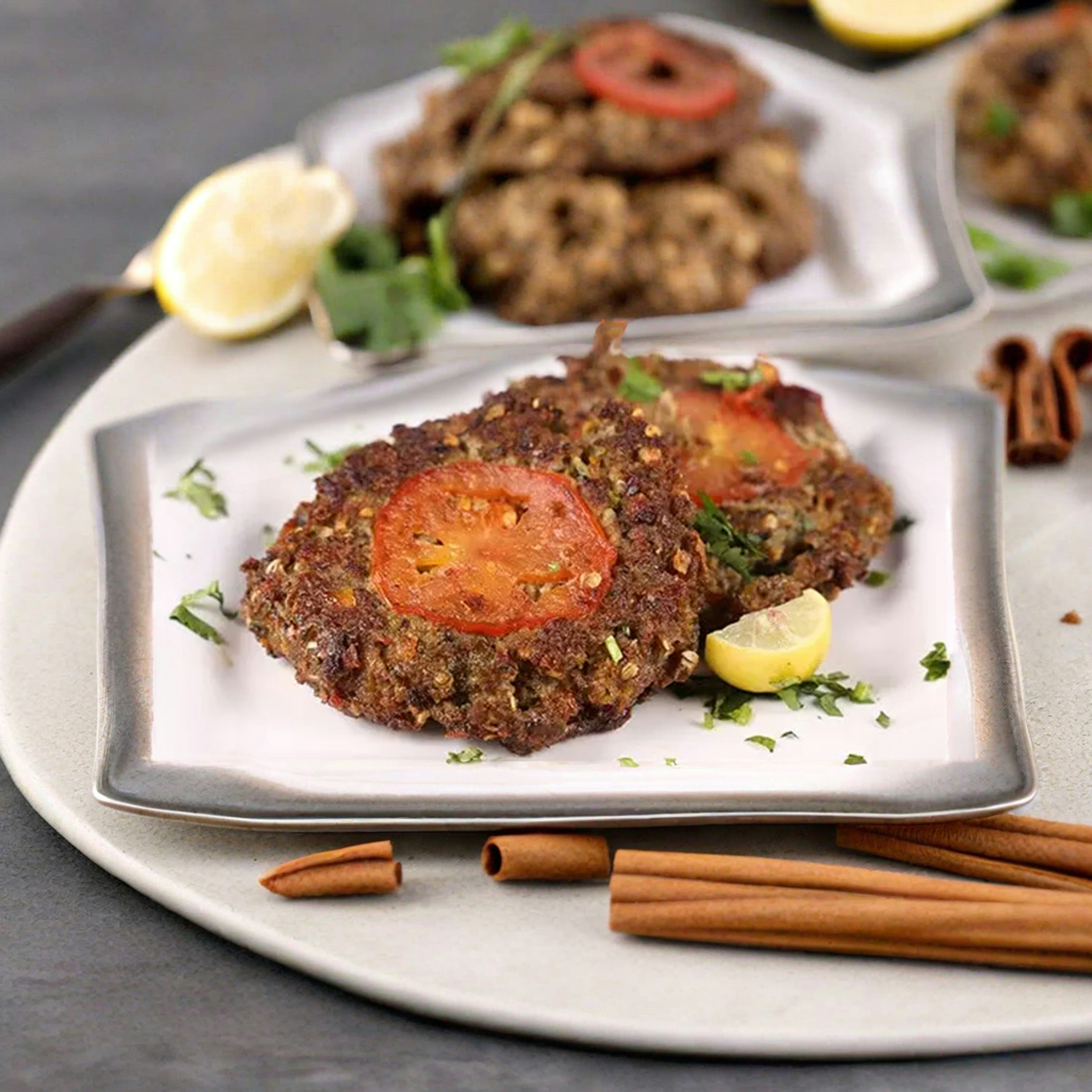 a white plate topped with food on top of a table