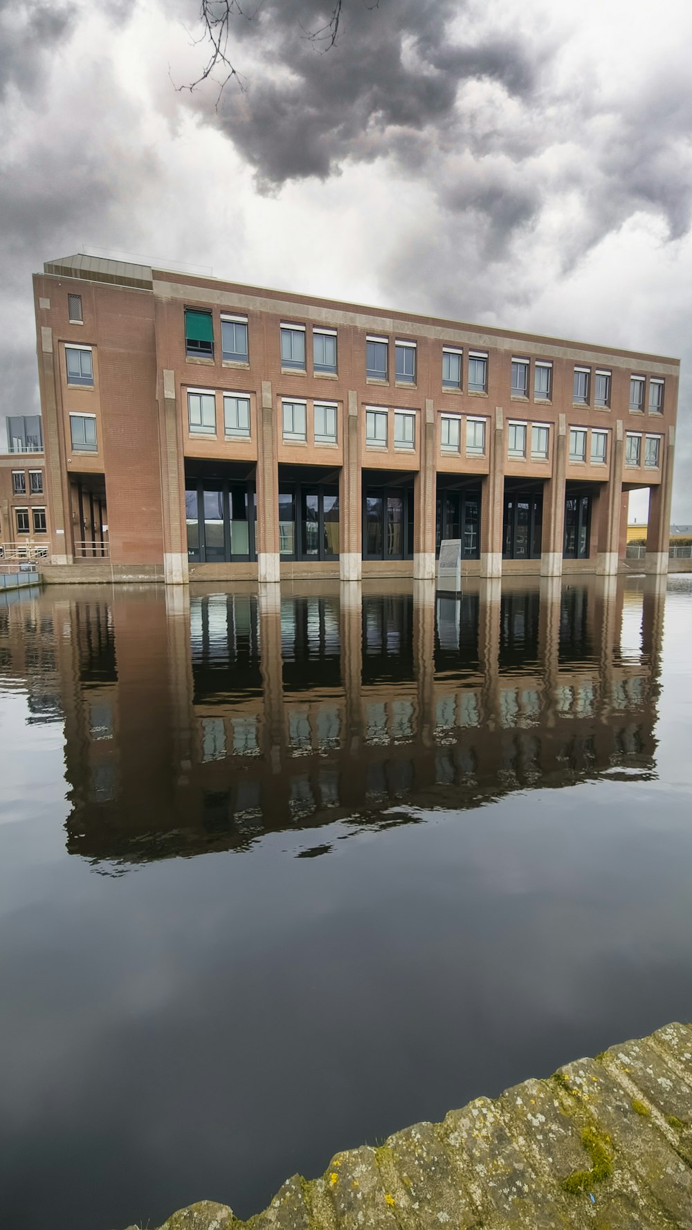 a large building sitting on top of a body of water