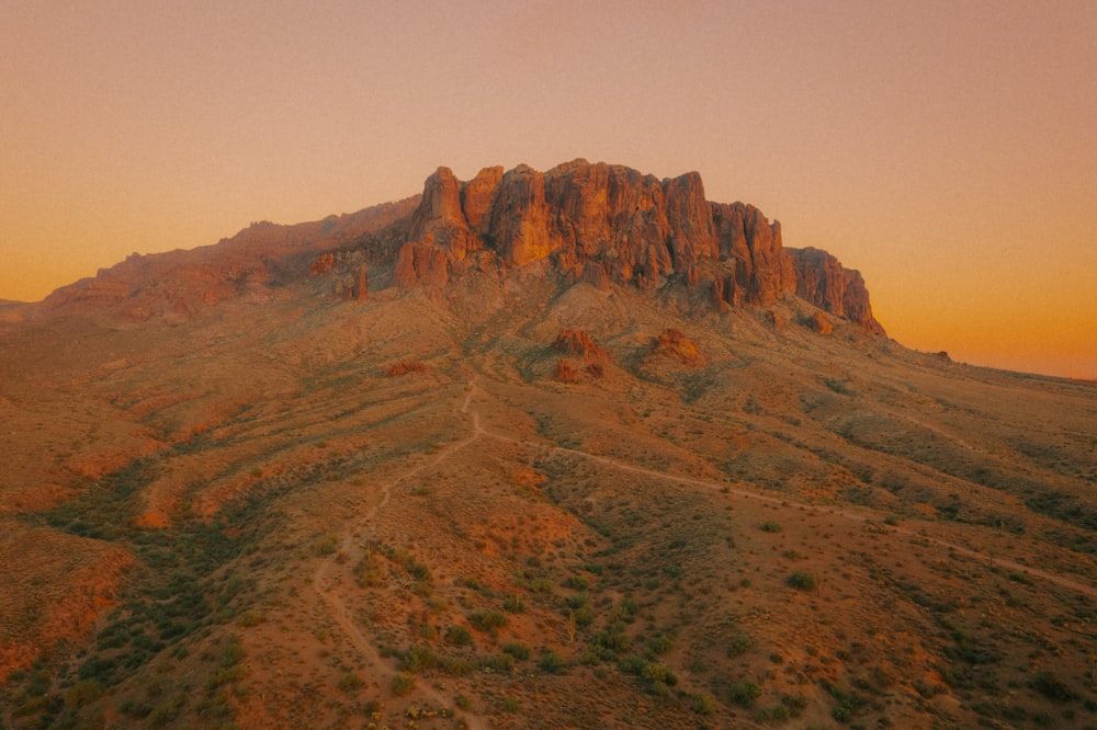 a very tall mountain with a sky background