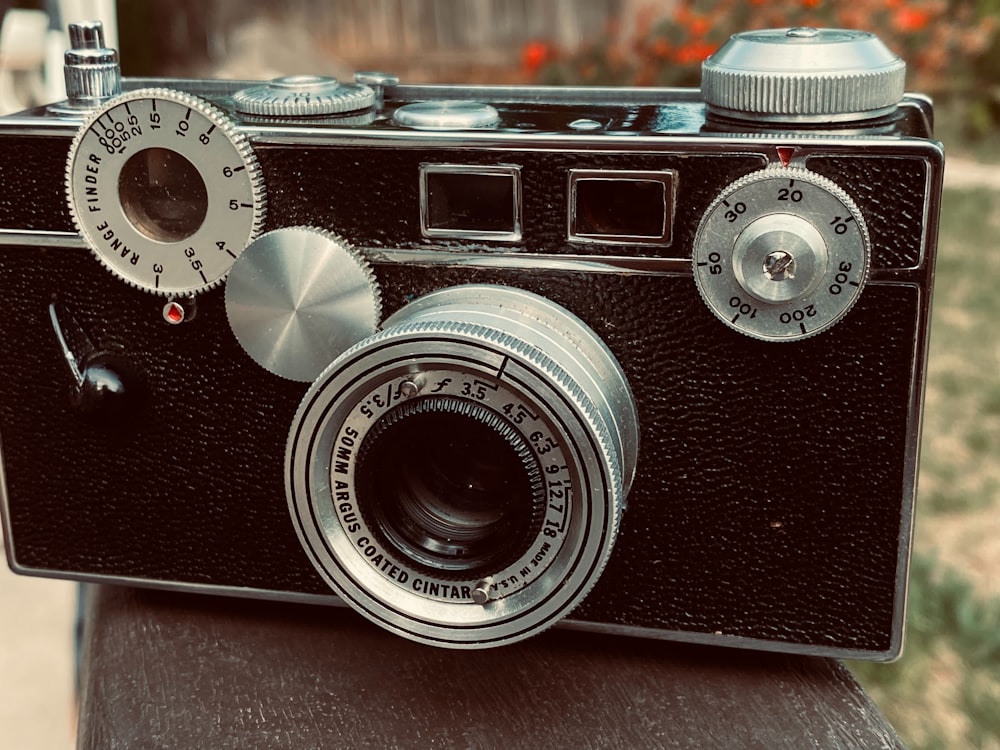 a camera sitting on top of a wooden table