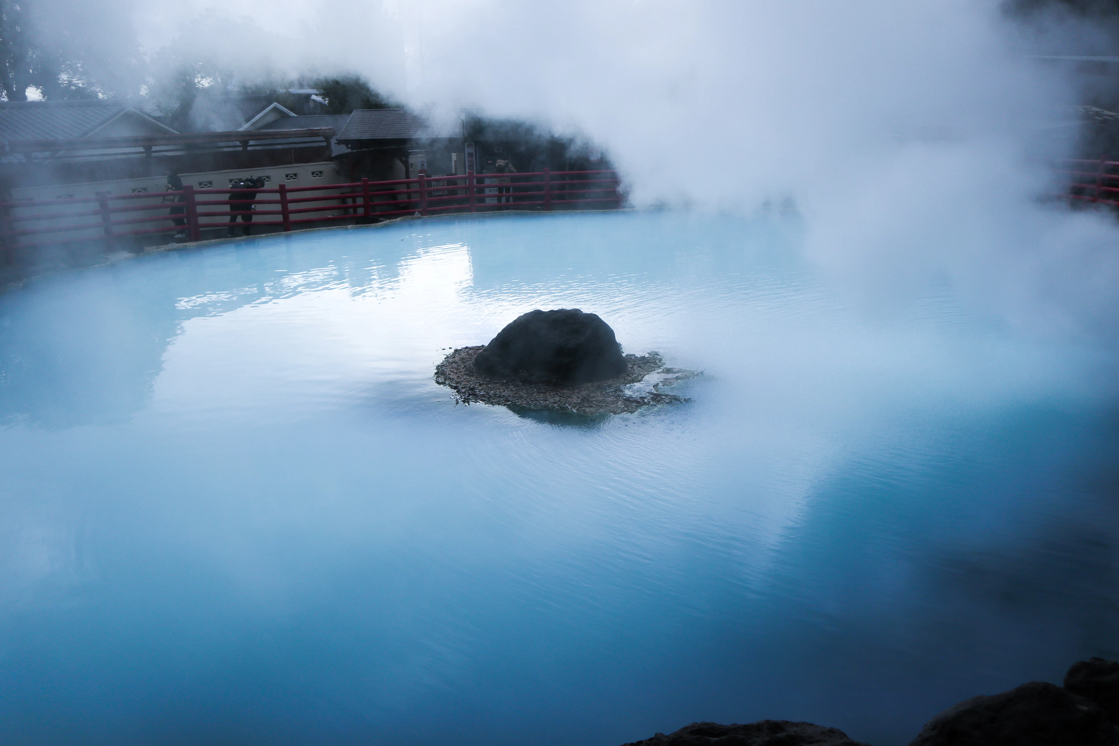 The steaming milky-blue pool of Kamado Jigoku in Beppu