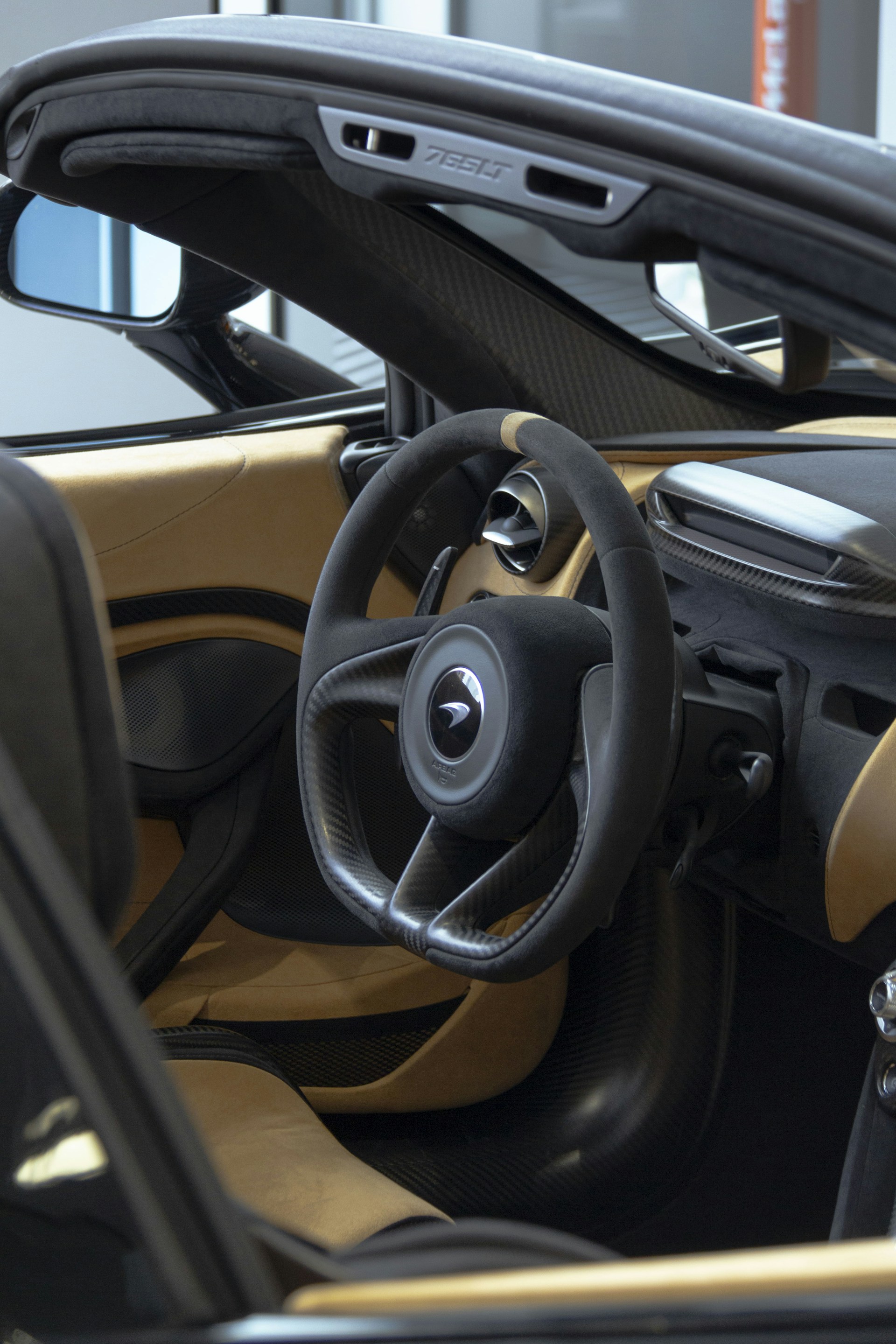 the interior of a car with a steering wheel