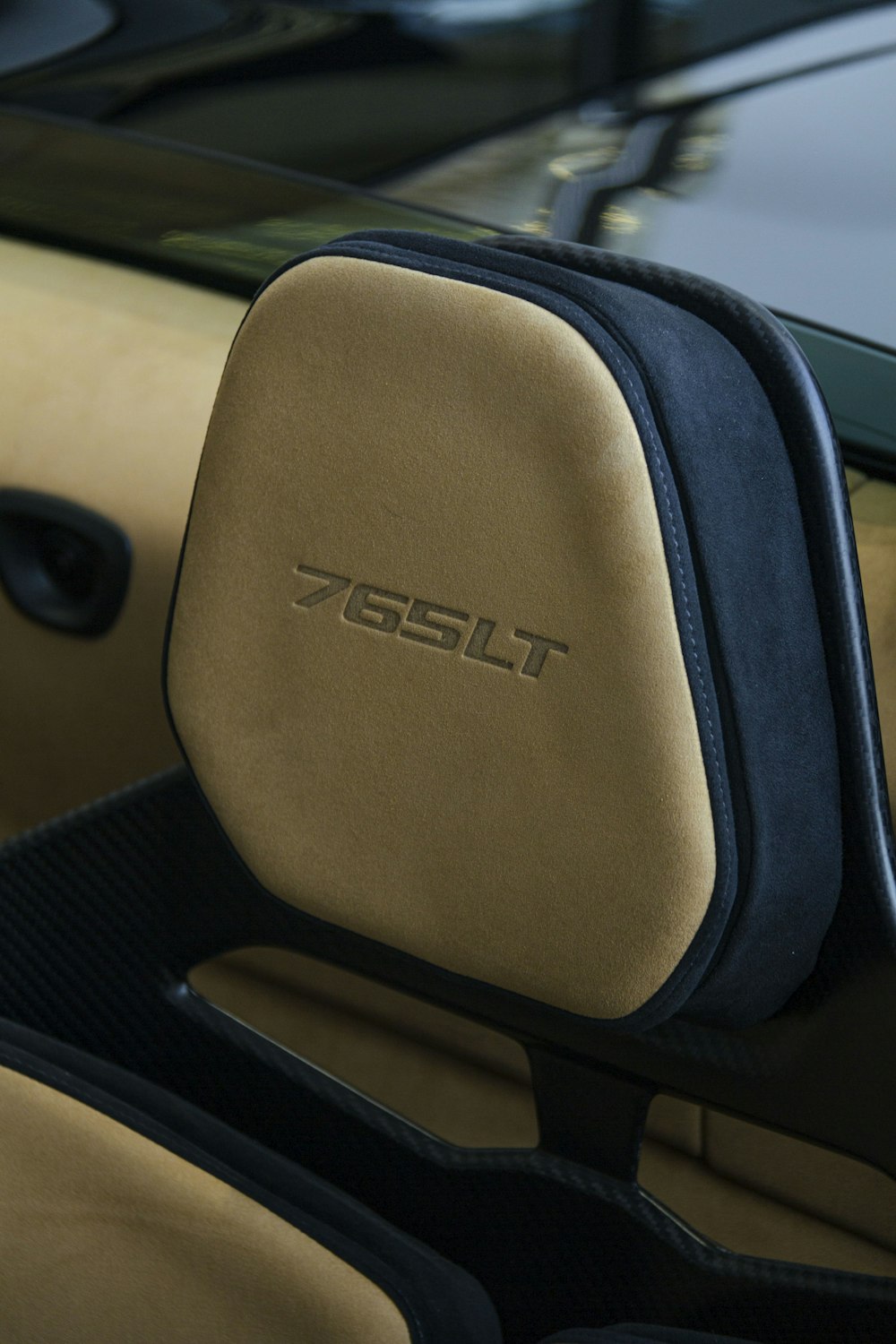 a close up of a car's interior with the seat up