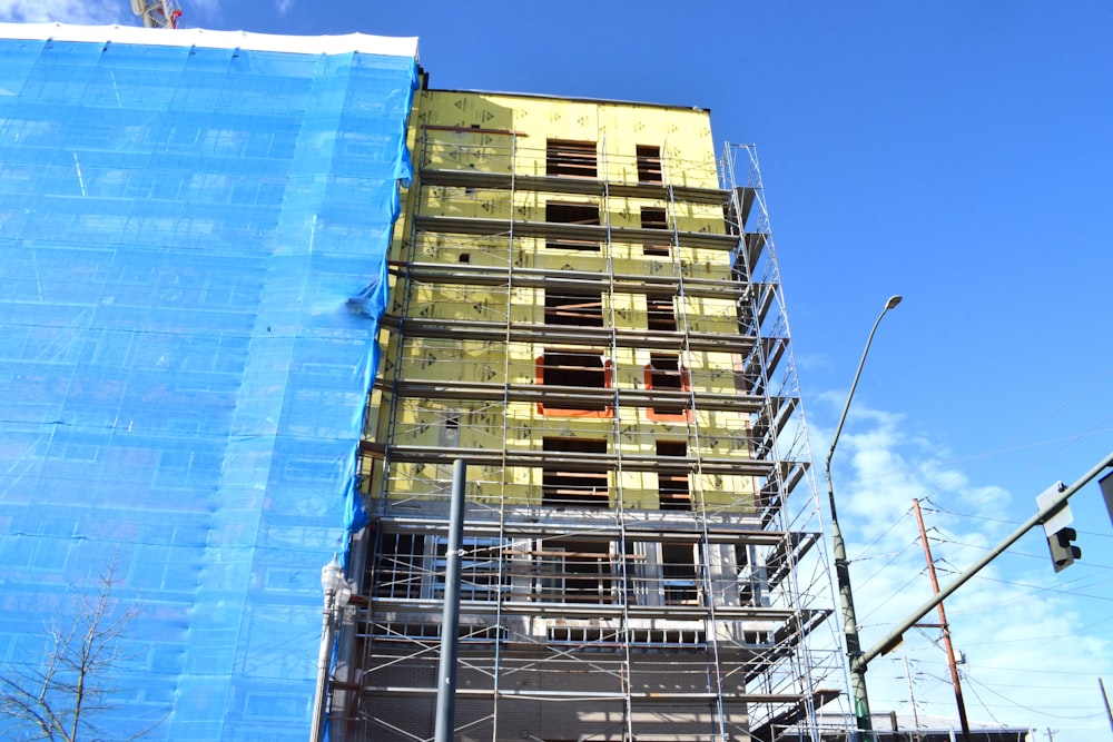 a tall building with scaffolding on the side of it