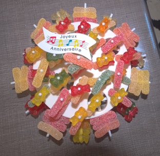a bunch of gummy bears sitting on top of a table