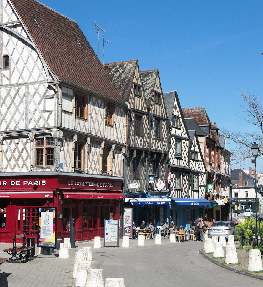 a row of buildings on a city street