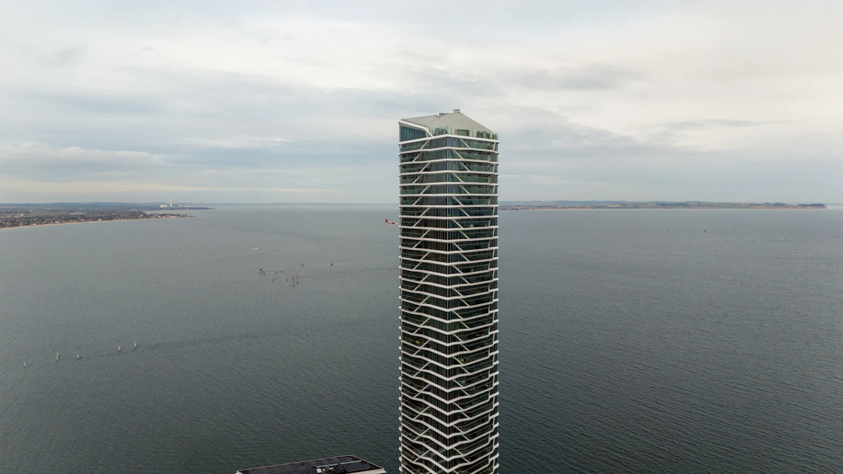 Aerial view of a waterfront residential tower