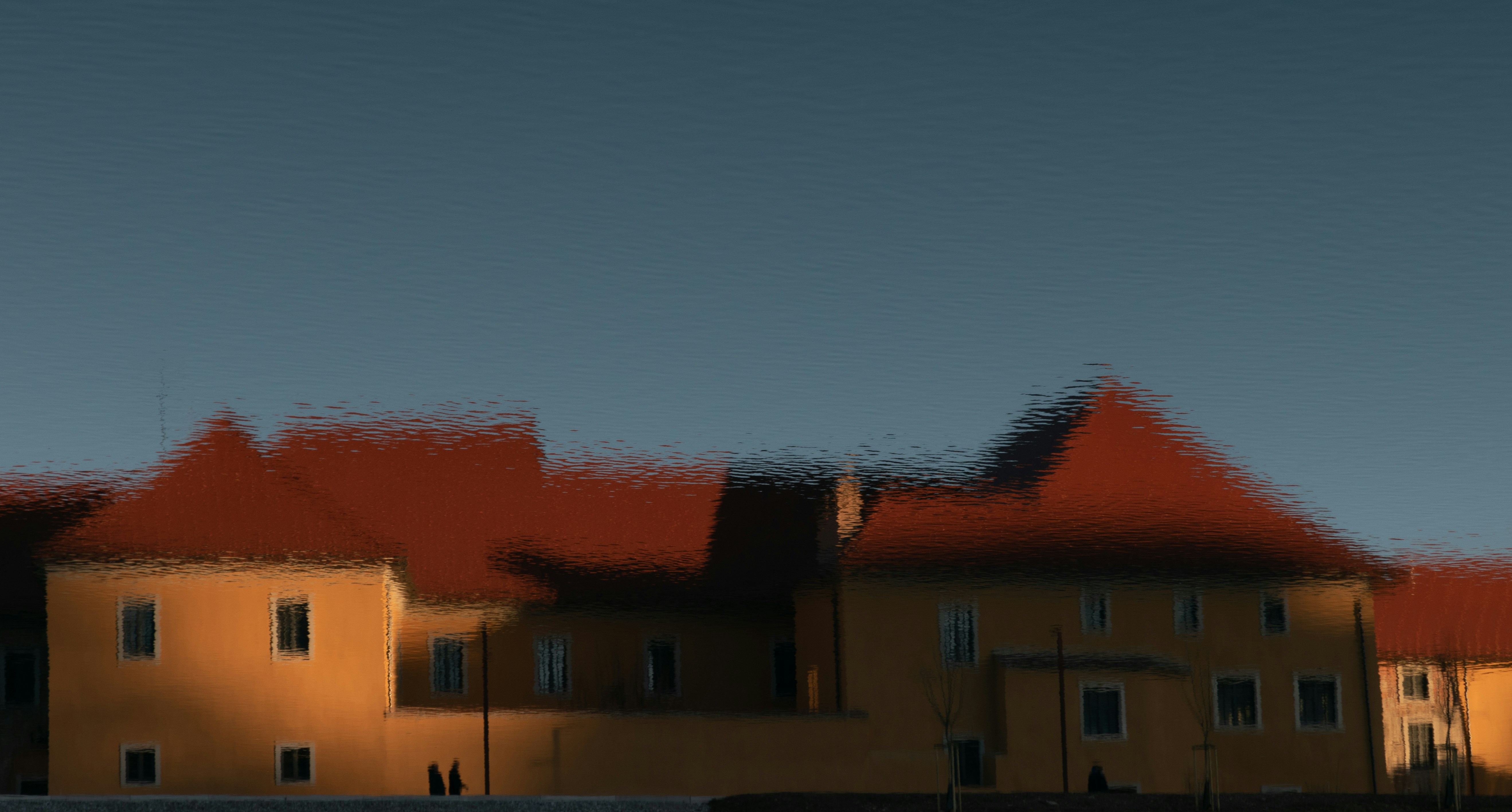 a blurry photo of a building with a clock tower, 