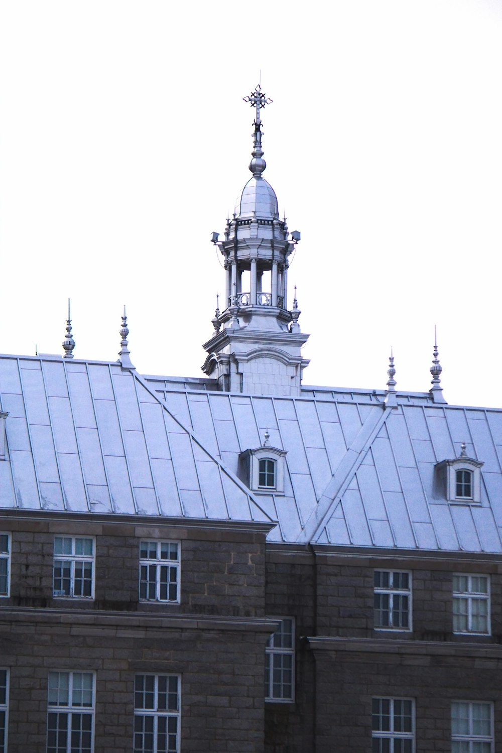 a large building with a clock on the top of it