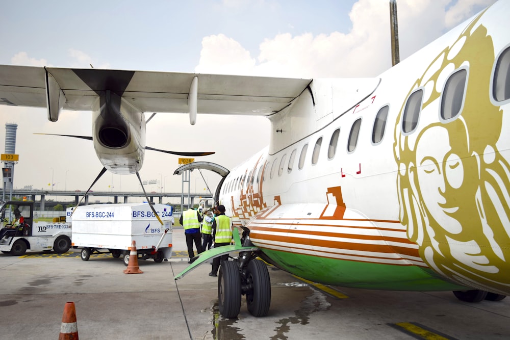 a plane with a man on the front of it