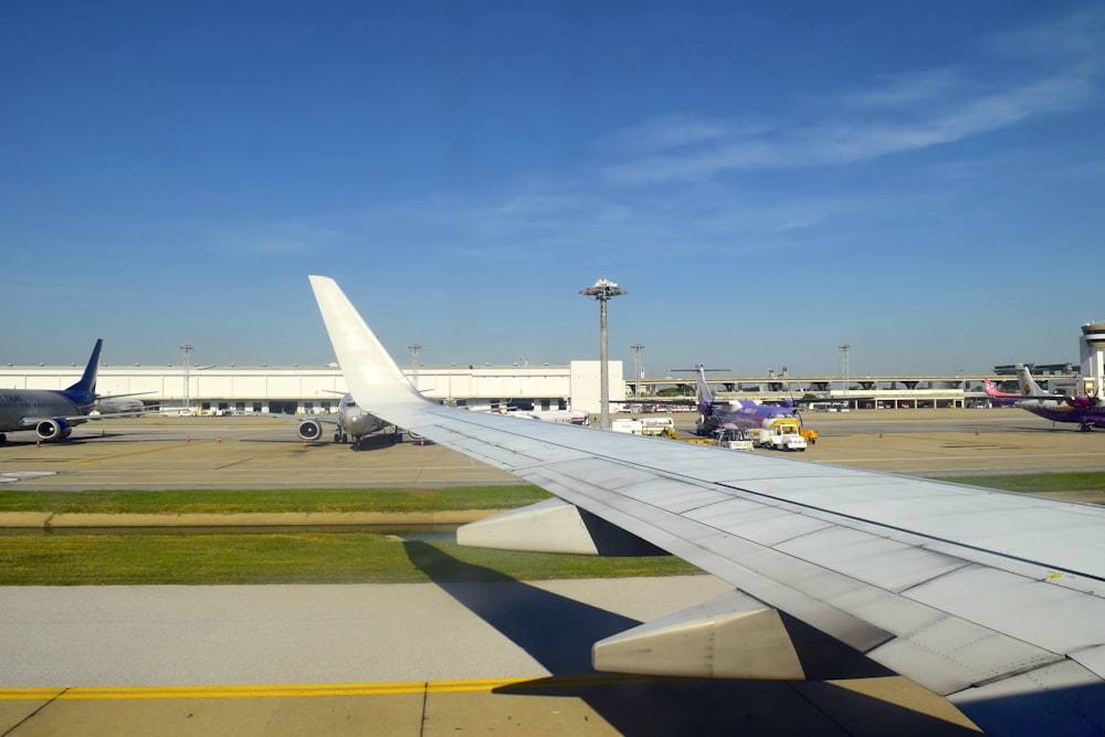 a view of an airport from the window of an airplane