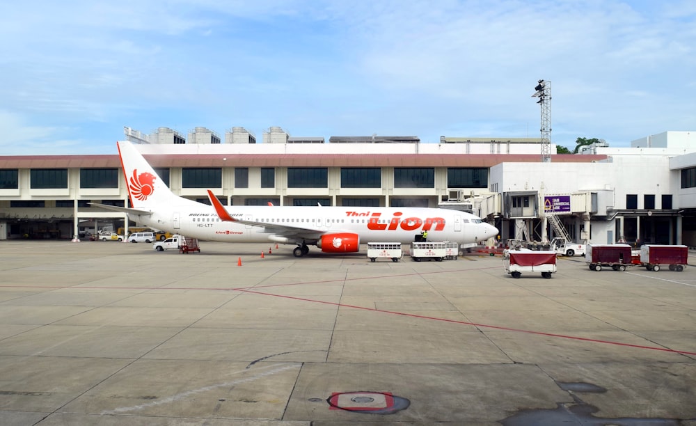 a large jetliner sitting on top of an airport tarmac