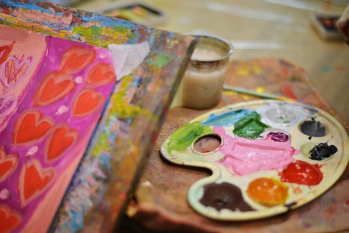 a palette of paint sitting on top of a table
