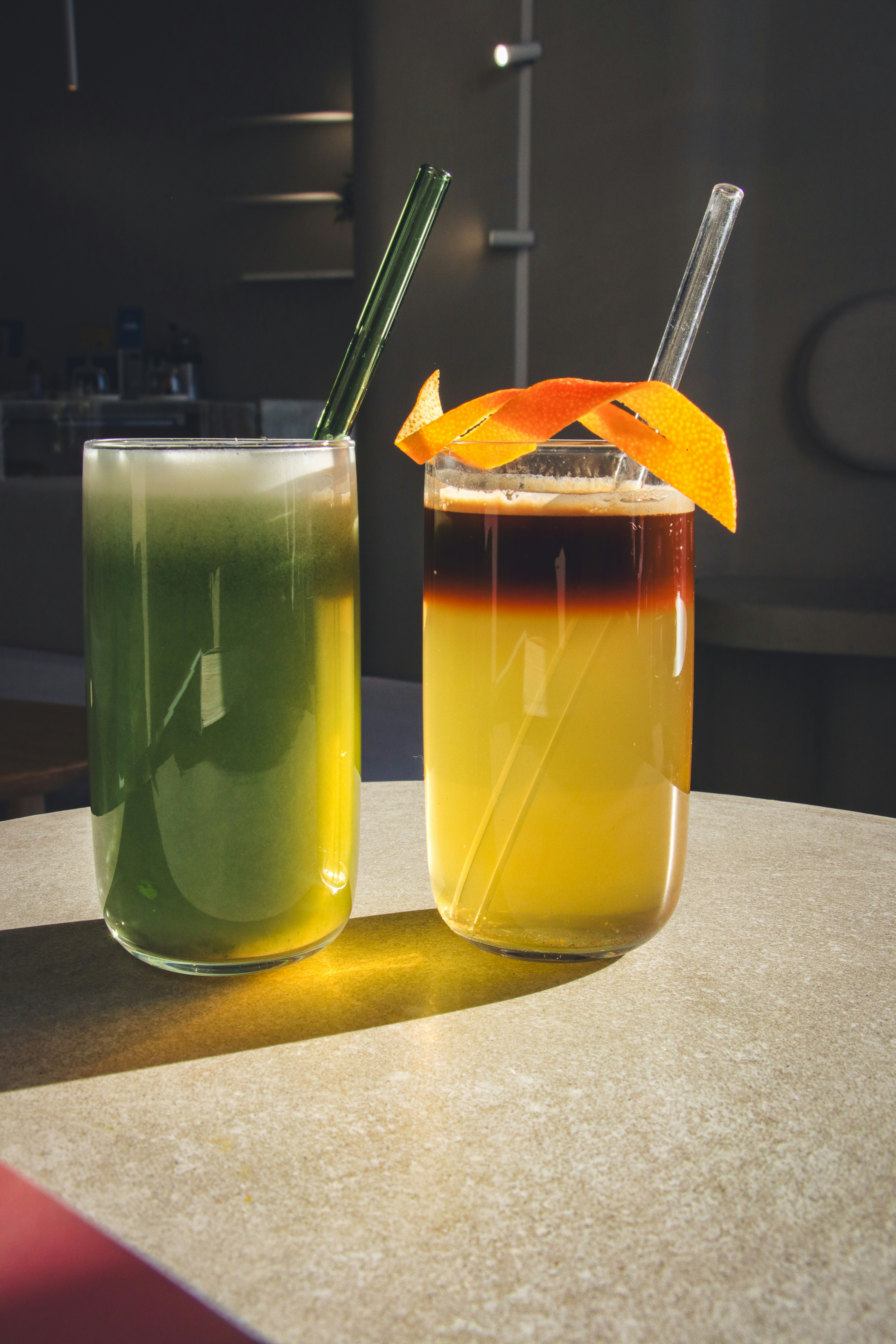 a couple of drinks sitting on top of a table