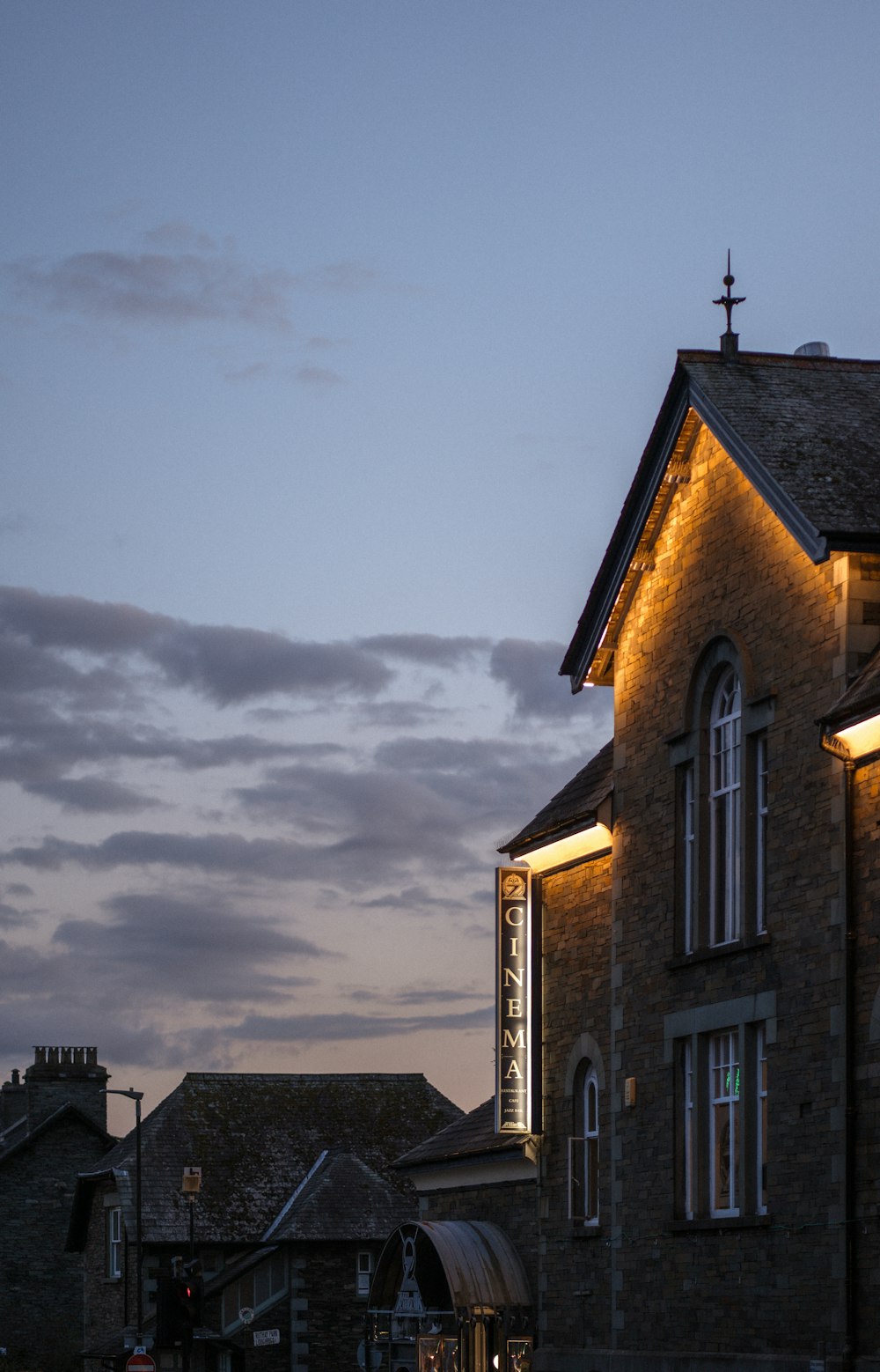 a building with a cross on the top of it