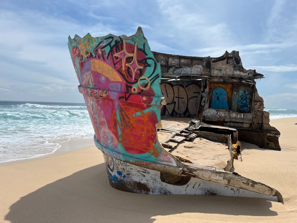 a boat that is sitting in the sand