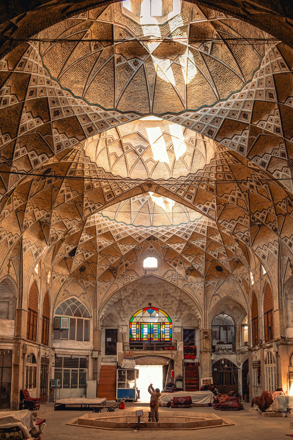 the inside of a building with a large ceiling