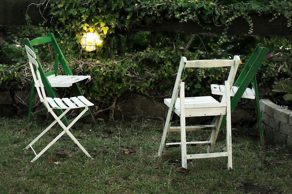 a couple of lawn chairs sitting next to each other