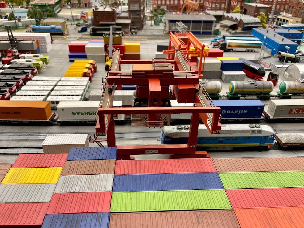 a model train yard with a lot of toy trains