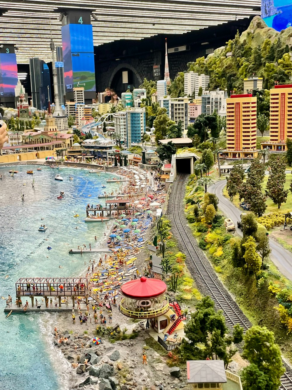a model of a beach with a lot of people on it
