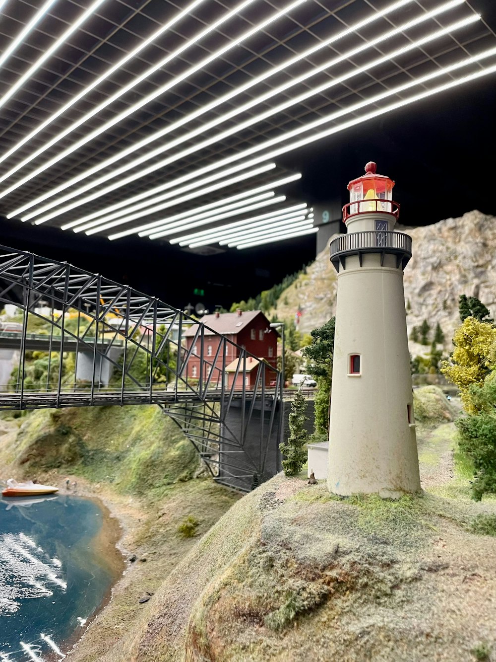 a model of a lighthouse and a bridge
