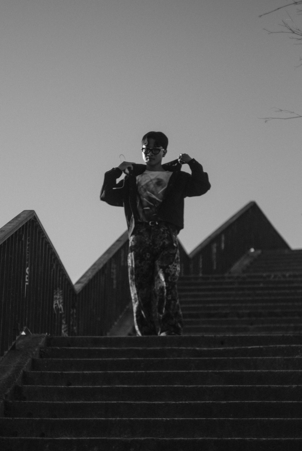 a man standing on a set of stairs