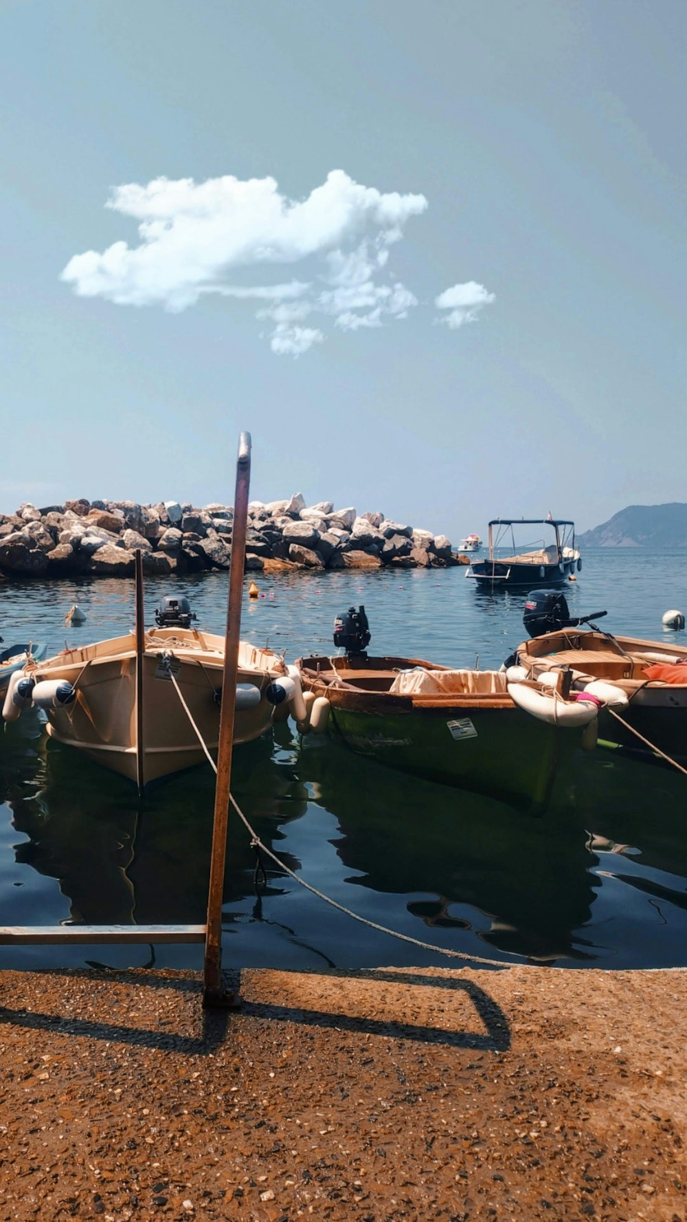 a couple of boats that are sitting in the water