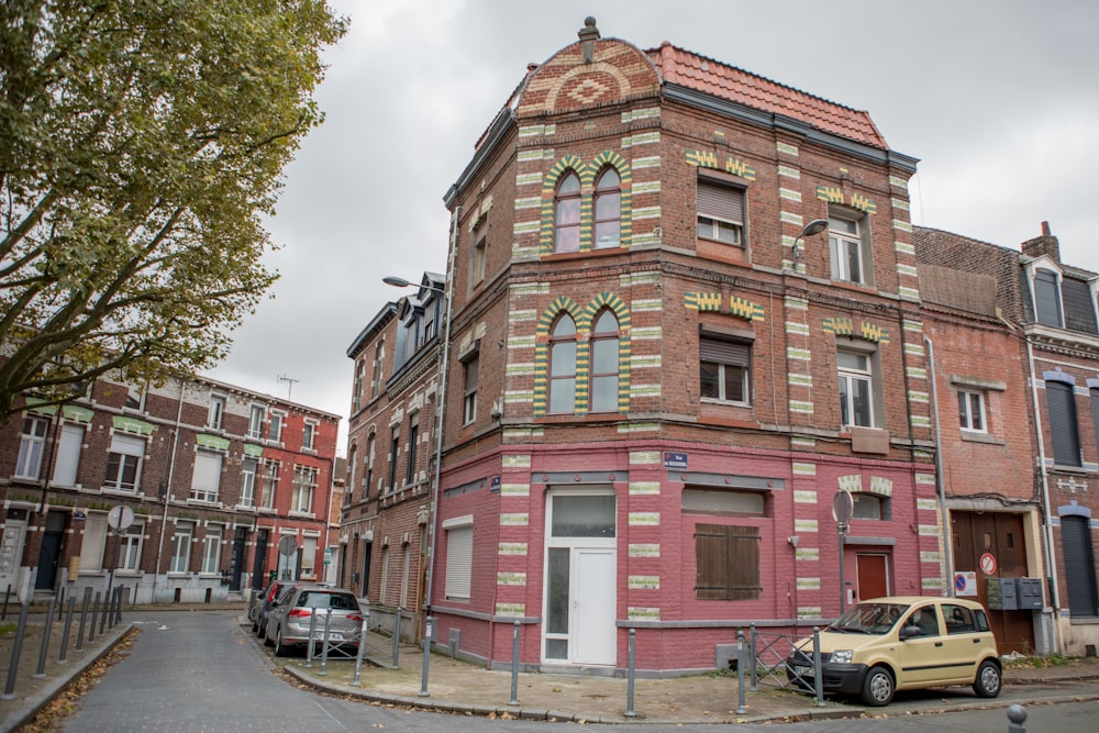 a red brick building with a clock on the top of it