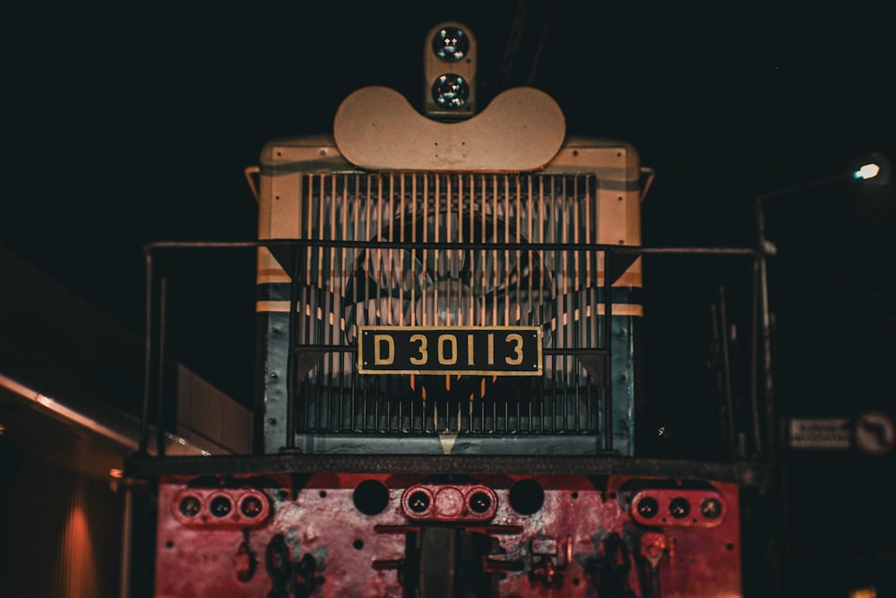 a close up of a train with a fan on top of it