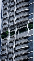 a tall building with a bunch of balconies on it