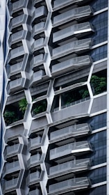 a tall building with a bunch of balconies on it