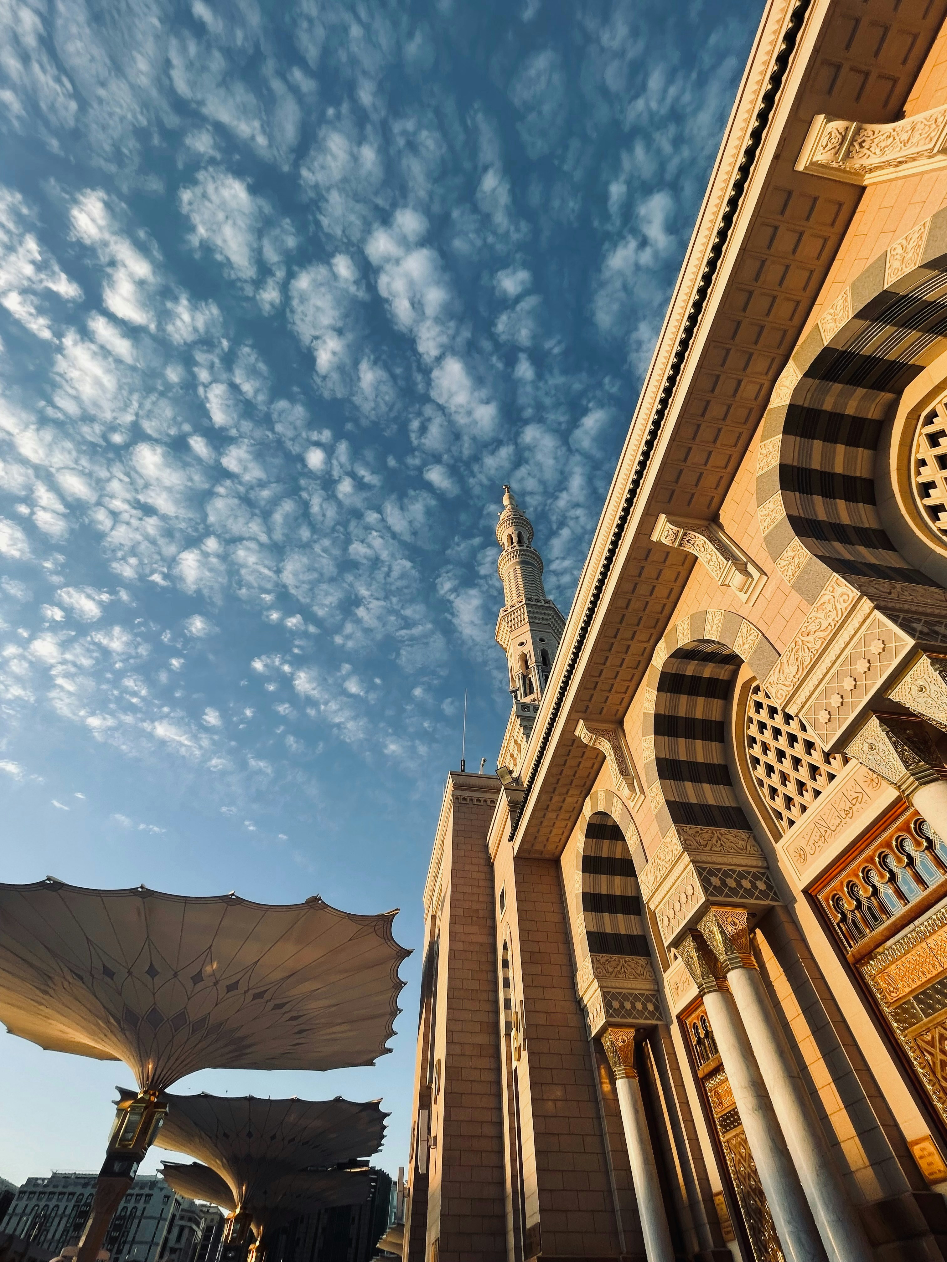 a large building with a clock on the side of it
