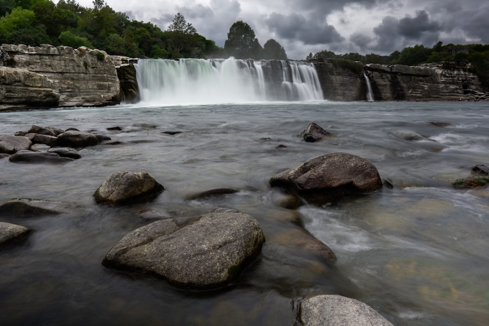 a waterfall with a large amount of water coming out of it