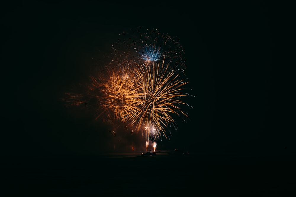 a fireworks display in the night sky