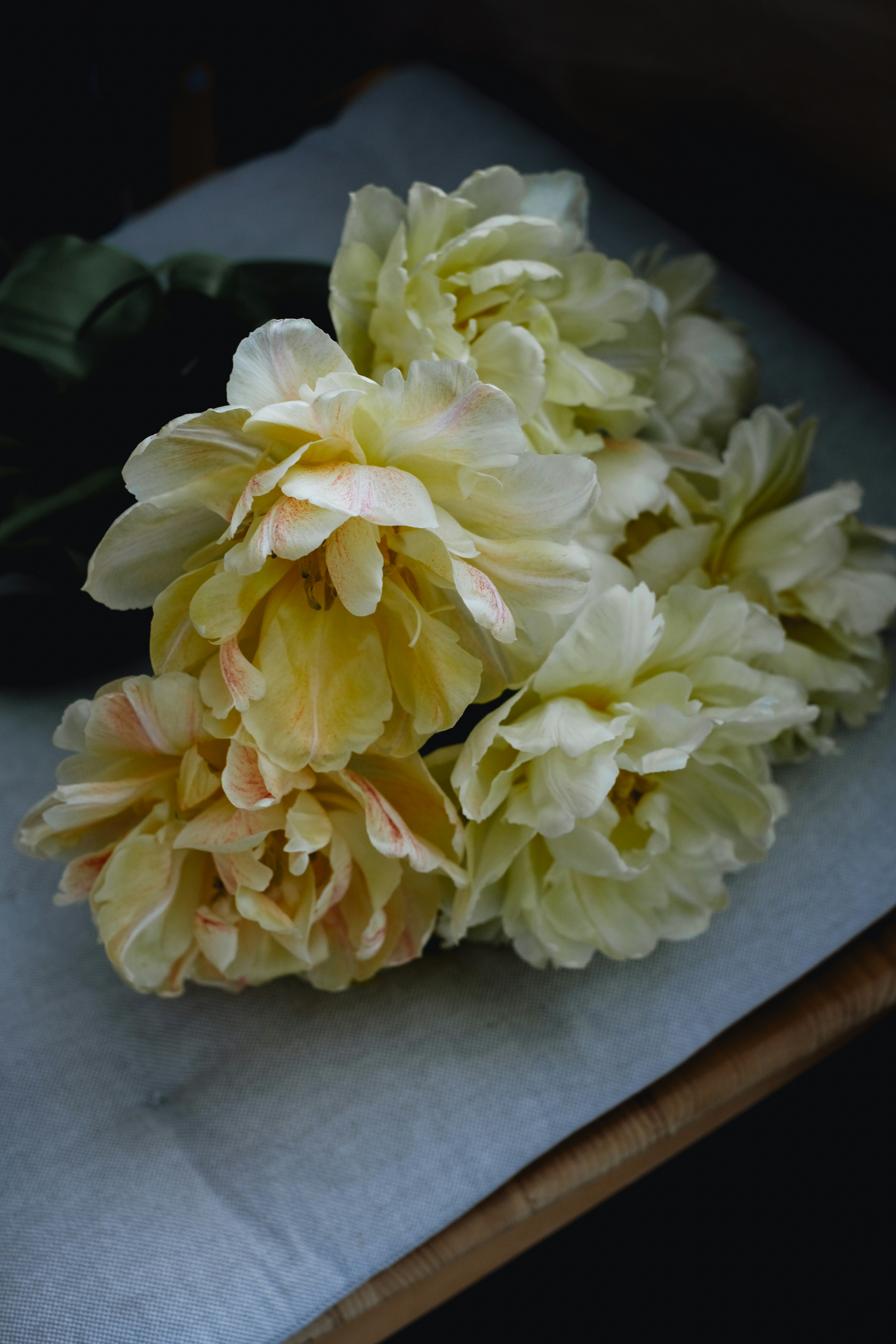 a bunch of flowers sitting on top of a table