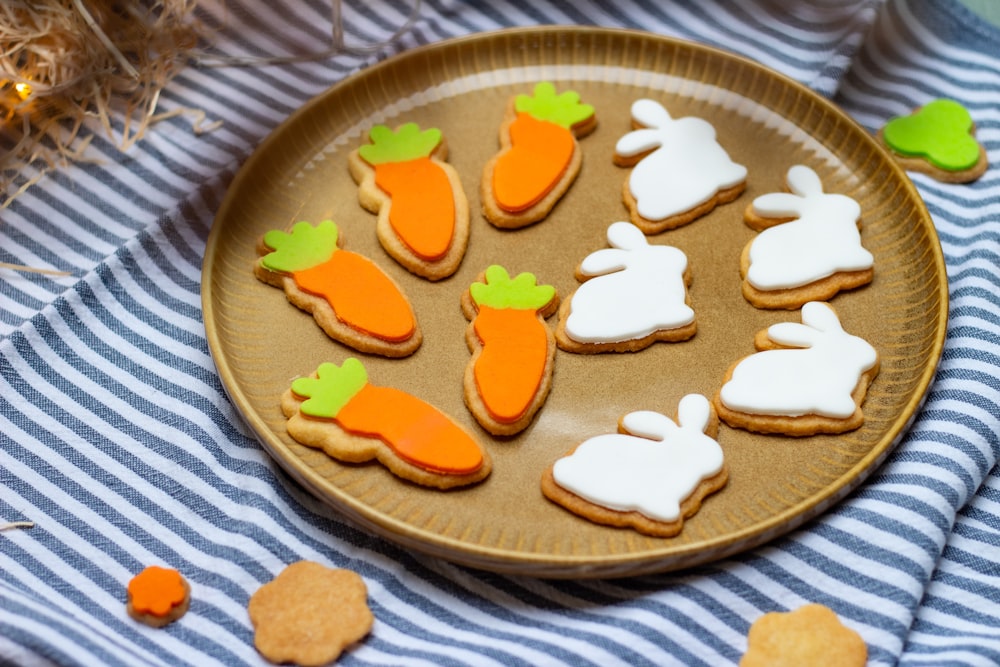 a plate of decorated cookies on a table