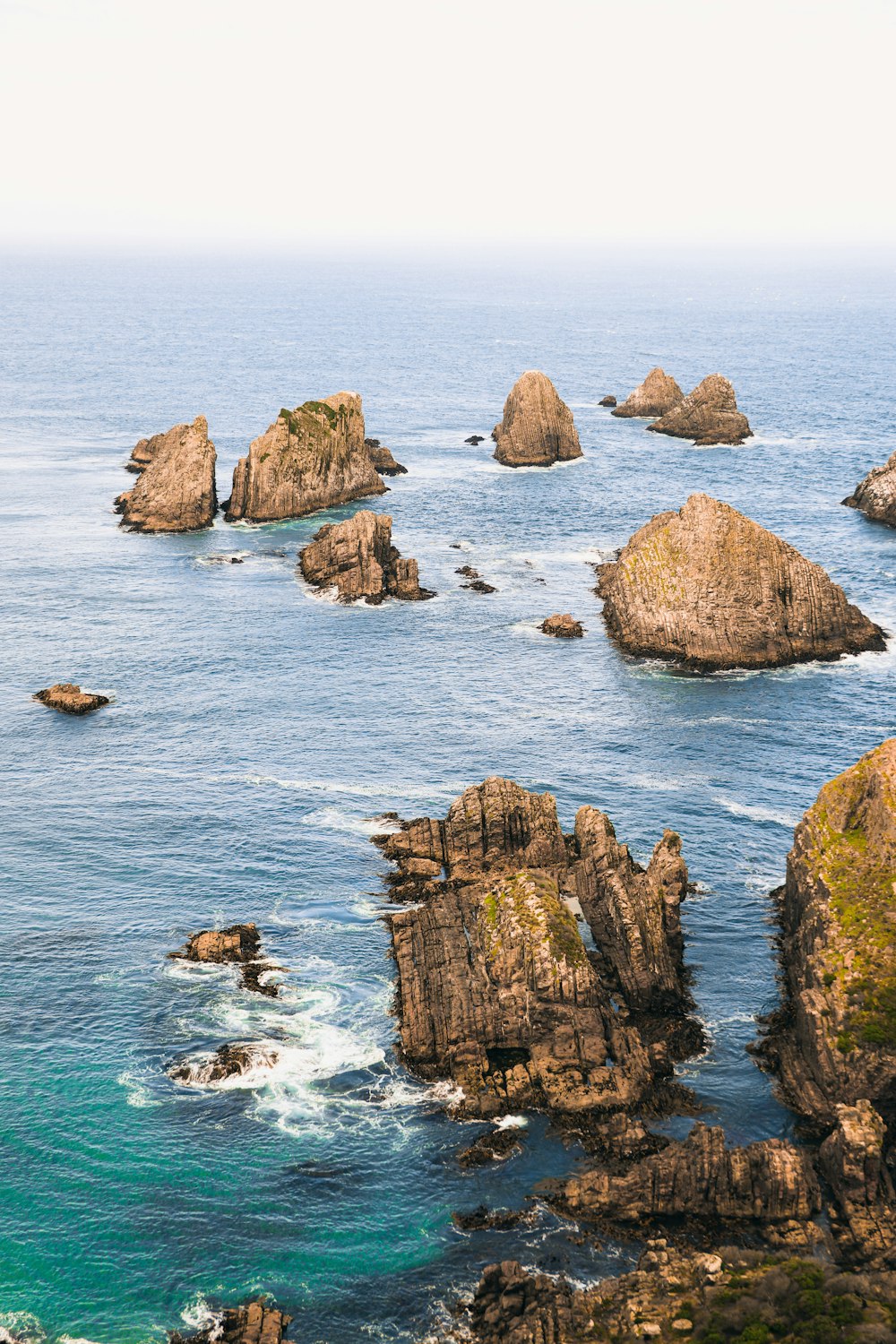 a large body of water surrounded by rocks